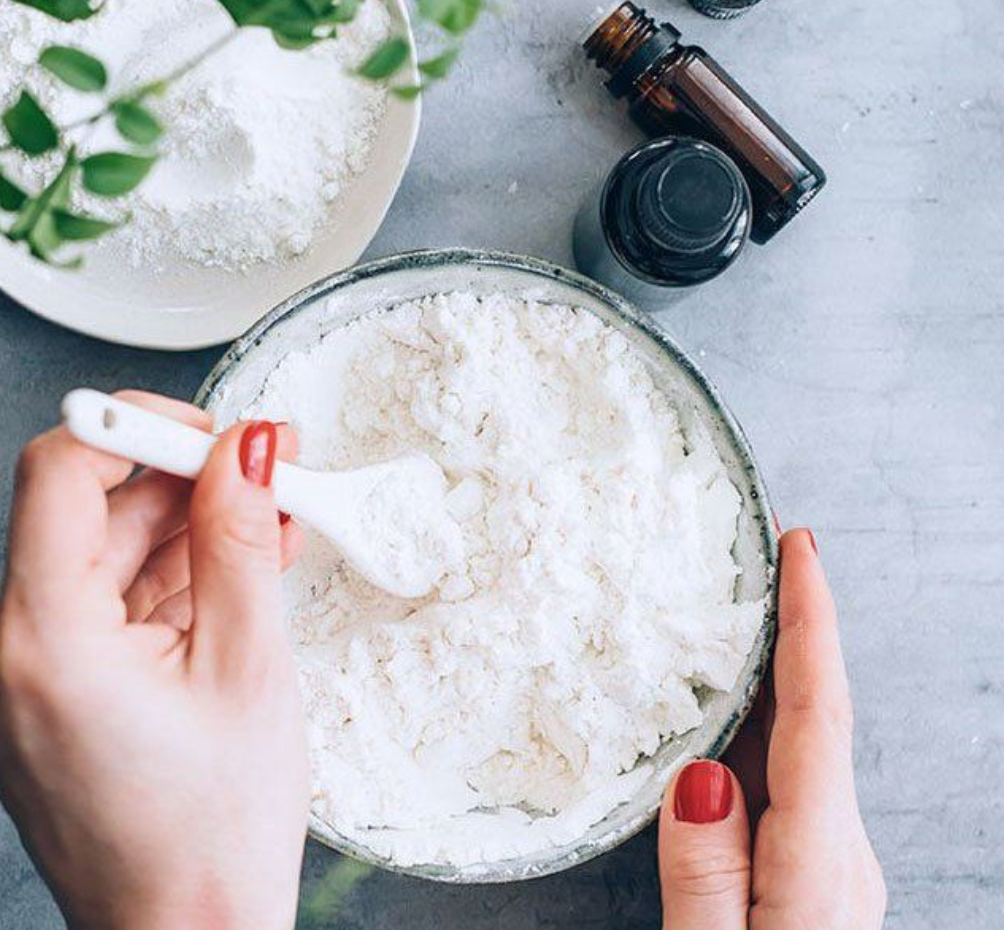 Carpet refresher powder with essential oil bottle